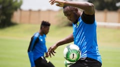 Usain Bolt has "a bit of work to do" to realise pro football dream