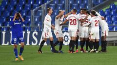 GETAFE, SPAIN - DECEMBER 12: Sevilla players celebrate their first goal, an own goal scored by Xabier Etxeita of Getafe (not in picture) during the La Liga Santander match between Getafe CF and Sevilla FC at Coliseum Alfonso Perez on December 12, 2020 in 
