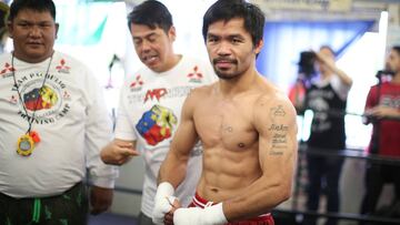 Boxer Manny Pacquiao of the Philippines works out in advance of his WBO welterweight bout against Jessie Vargas, in Los Angeles, California, U.S., October 26, 2016.  REUTERS/Lucy Nicholson