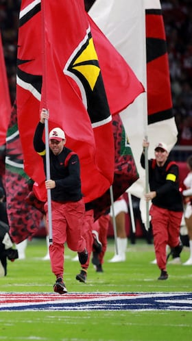 FILE PHOTO: American Football - NFL - Arizona Cardinals v San Francisco 49ers - Estadio Azteca, Mexico City, Mexico - November 21, 2022 The Arizona Cardinals mascot leads his team before the match REUTERS/Henry Romero/File Photo