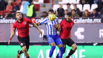 Nicolas Diaz (L) of Tijuana, Rodrigo Aguirre (C) of Monterrey and Diego Barbosa (R) of Tijuana during the 9th round match between Tijuana and Monterrey as part of the Torneo Clausura 2024 Liga BBVA MX at Caliente Stadium on February 28, 2024 in Tijuana, Baja California, Mexico.