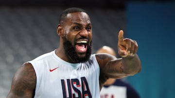 US forward LeBron James (C) gestures during a training session at the Pierre-Mauroy stadium in Villeneuve-d�Ascq, northern France, on July 24, 2024, ahead of the Paris 2024 Olympic games. (Photo by Thomas COEX / AFP)