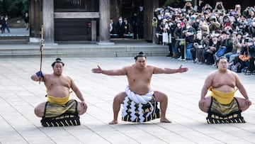 Mongolian born sumo wrestler and new yokozuna, or grand champion, Hoshoryu (C) performs the ring-entering ceremony at Meiji Shrine in Tokyo on January 31, 2025. (Photo by Philip FONG / AFP)
