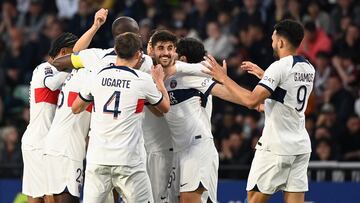 Paris Saint-Germain's players celebrate scoring their team's first goal during the French L1 football match between FC Metz and Paris Saint-Germain (PSG) at the Saint-Symphorien Stadium in Longeville-les-Metz, eastern France, on May 19, 2024. (Photo by Jean-Christophe VERHAEGEN / AFP)
