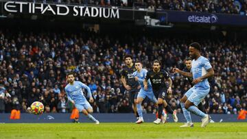 Soccer Football - Premier League - Manchester City v Wolverhampton Wanderers - Etihad Stadium, Manchester, Britain - December 11, 2021 Manchester City's Raheem Sterling scores their first goal from the penalty spot Action Images via Reuters/Jason Cai