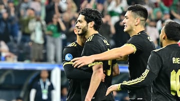 Mexico's forward #09 Raul Jimenez (2L) celebrates scoring his team's second goal on a penalty kick during the CONCACAF Nations League final football match between Mexico and Panama at SoFi Stadium in Inglewood, California, on March 23, 2025. (Photo by Frederic J. Brown / AFP)