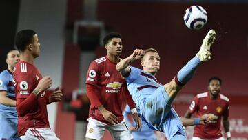 West Ham's Tomas Soucek kicks the ball clear during the English Premier League soccer match between Manchester United and West Ham United at Old Trafford, Manchester, England, Sunday, March. 14, 2021. (AP Photo/Peter Powell,Pool)