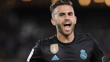 Real Madrid's forward from Spain Borja Mayoral celebrates a goal during the Spanish league football match Real Sociedad vs Real Madrid CF at the Anoeta stadium in San Sebastian on September 17, 2017. / AFP PHOTO / ANDER GILLENEA
