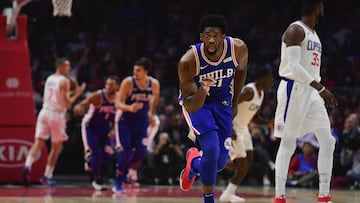 LOS ANGELES, CA - NOVEMBER 13: Joel Embiid #21 of the Philadelphia 76ers reacts to his three pointer during the first half against the LA Clippers at Staples Center on November 13, 2017 in Los Angeles, California.   Harry How/Getty Images/AFP
 == FOR NEWSPAPERS, INTERNET, TELCOS &amp; TELEVISION USE ONLY ==