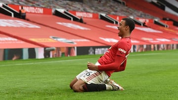 Manchester United&#039;s English striker Mason Greenwood celebrates after scoring a goal during the English Premier League football match between Manchester United and Bournemouth at Old Trafford in Manchester, north west England, on July 4, 2020. (Photo 