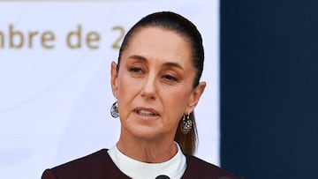 Mexico's President Claudia Sheinbaum speaks as she hosts a parade celebrating Independence Day, in Mexico City, Mexico September 16, 2025. REUTERS/Raquel Cunha