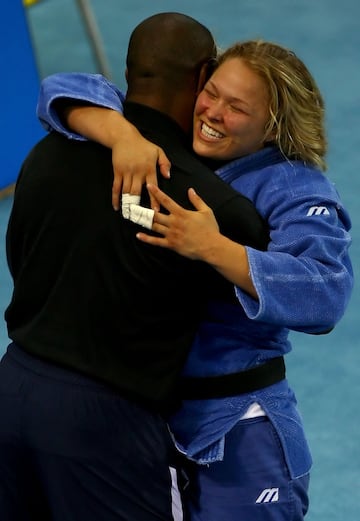 Nació en Santa Mónica, California, en 1987. Las artes marciales siempre estuvieron girando a su alrededor, por lo que estaba predestinada a ellas. La que le dio fama olímpica fue el judo. Tanto en Atenas 2004 como en Pekín 2008 participó y se colgó un bronce en su última participación, convirtiéndose en la primera estadounidense en ganar una medalla en este deporte.
Después, se pasó a las artes marciales mixtas y competió en la UFC y la WWE. Eso la llevó al cine. No solo protagoniza muchos vídeojuegos sino que ha participado en varias películas sobre esta temática. La más conocida, Fast and Furious 7.