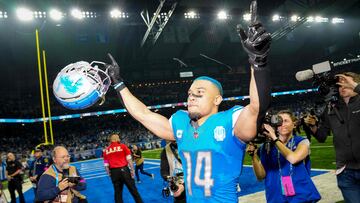 DETROIT, MICHIGAN - JANUARY 21: Amon-Ra St. Brown #14 of the Detroit Lions waves to fans and leaves the field after the win against the Tampa Bay Buccaneers at Ford Field on January 21, 2024 in Detroit, Michigan.   Nic Antaya/Getty Images/AFP (Photo by Nic Antaya / GETTY IMAGES NORTH AMERICA / Getty Images via AFP)