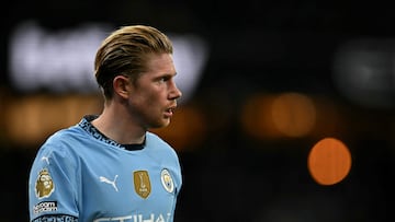 Manchester City's Belgian midfielder #17 Kevin De Bruyne looks on during the English Premier League football match between Manchester City and Manchester United at the Etihad Stadium in Manchester, north west England, on December 15, 2024. (Photo by Paul ELLIS / AFP) / RESTRICTED TO EDITORIAL USE. No use with unauthorized audio, video, data, fixture lists, club/league logos or 'live' services. Online in-match use limited to 120 images. An additional 40 images may be used in extra time. No video emulation. Social media in-match use limited to 120 images. An additional 40 images may be used in extra time. No use in betting publications, games or single club/league/player publications. /