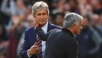 Soccer Football - Premier League - West Ham United v Manchester United - London Stadium, London, Britain - September 29, 2018  West Ham manager Manuel Pellegrini with Manchester United manager Jose Mourinho after the match  REUTERS/Eddie Keogh  EDITORIAL USE ONLY. No use with unauthorized audio, video, data, fixture lists, club/league logos or &quot;live&quot; services. Online in-match use limited to 75 images, no video emulation. No use in betting, games or single club/league/player publications.  Please contact your account representative for further details.