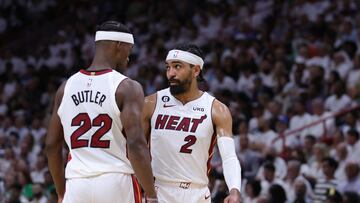 MIAMI, FLORIDA - MAY 23: Gabe Vincent #2 speaks with Jimmy Butler #22 of the Miami Heat against the Boston Celtics during the second quarter in game four of the Eastern Conference Finals at Kaseya Center on May 23, 2023 in Miami, Florida. NOTE TO USER: User expressly acknowledges and agrees that, by downloading and or using this photograph, User is consenting to the terms and conditions of the Getty Images License Agreement.   Megan Briggs/Getty Images/AFP (Photo by Megan Briggs / GETTY IMAGES NORTH AMERICA / Getty Images via AFP)