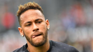 (FILES) In this file photo taken on August 18, 2018 Paris Saint-Germain&#039;s Brazilian forward Neymar sticks out his tongue before the French L1 football match between Guingamp and Paris Saint-Germain, at the Roudourou stadium in Guingamp. - Brazil and 