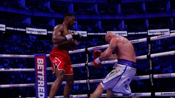 Boxing - Anthony Joshua v Robert Helenius -  O2 Arena, London, Britain - August 12, 2023 Antonhy Joshua knocks down Robert Helenius Action Images via Reuters/Andrew Couldridge