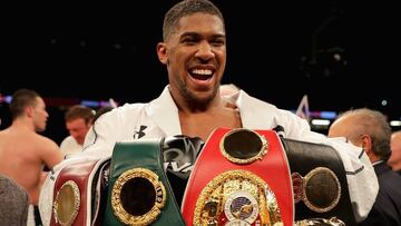 Anthony Joshua celebrates victory after his WBA, IBF, WBO & IBO Heavyweight Championship title fight against Joseph Parker at Principality Stadium on March 31, 2018 in Cardiff, Wales.