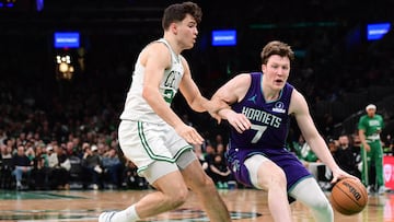 Charlotte Hornets guard Kon Knueppel (7) controls the ball while Boston Celtics guard Hugo Gonzalez (28) defends during the second half at TD Garden.