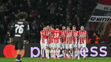 PSV's players celebrates after scoring their first goal during the UEFA Champions League, league phase day 8, football match between PSV Eindhoven (NED) and Liverpool FC (ENG) at the the Philips Stadion, in Eindhoven, on January 29, 2025. (Photo by NICOLAS TUCAT / AFP)