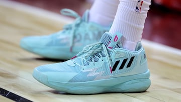 Jabari Smith Jr. #1 of the Houston Rockets wears adidas shoes as he sits on the bench during a game against the San Antonio Spurs during the 2022 NBA Summer League at the Thomas & Mack Center