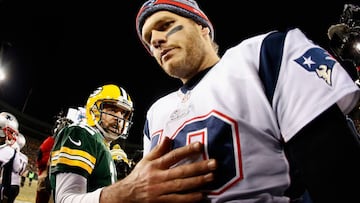 GREEN BAY, WI - NOVEMBER 30: Quarterback Tom Brady #12 of the New England Patriots walks away from Aaron Rodgers #12 of the Green Bay Packers after shaking hands following the NFL game at Lambeau Field on November 30, 2014 in Green Bay, Wisconsin. The Packers defeated the Patriots 26-21.   Christian Petersen/Getty Images/AFP
 == FOR NEWSPAPERS, INTERNET, TELCOS &amp; TELEVISION USE ONLY ==