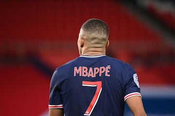 Paris Saint-Germain's French forward Kylian Mbappe walks on the pitch during the French L1 football match between Paris-Saint Germain (PSG) and AS Monaco FC at The Parc des Princes Stadium in Paris on February 21, 2021. (Photo by FRANCK FIFE / AFP)