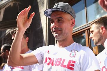 Josep Guardiola, head coach of Bayern Munich celebrates with the team winning the DFB German Cup title on the town hall balcony at the city hall in Munich, Germany, 22 May 2016. FC Bayern Munich defeated Borussia Dortmund 4-3 on penalties in the DFB Cup f
