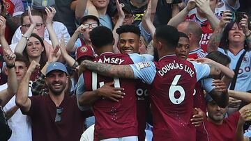 Aston Villa's English striker Ollie Watkins (C) celebrates with teammates after scoring their second goal during the English Premier League football match between Aston Villa and Brighton and Hove Albion at Villa Park in Birmingham, central England on May 28, 2023. (Photo by Geoff Caddick / AFP) / RESTRICTED TO EDITORIAL USE. No use with unauthorized audio, video, data, fixture lists, club/league logos or 'live' services. Online in-match use limited to 120 images. An additional 40 images may be used in extra time. No video emulation. Social media in-match use limited to 120 images. An additional 40 images may be used in extra time. No use in betting publications, games or single club/league/player publications. / 