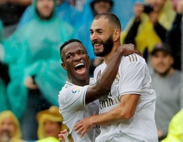 Buddies | Real Madrid's Karim Benzema celebrates with Vinicius Junior after scoring against Levante.