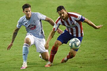 Koke y Santi Mina.