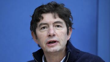 Christian Drosten, virologist of the Charite hospital, speaks during a press conference on the current coronavirus pandemic in Berlin, Germany, Friday, Jan. 14, 2022. (AP Photo/Michael Sohn)