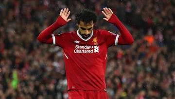 LIVERPOOL, ENGLAND - APRIL 24: Mohamed Salah of Liverpool celebrates as he scores his sides second goal during the UEFA Champions League Semi Final First Leg match between Liverpool and A.S. Roma at Anfield on April 24, 2018 in Liverpool, United Kingdom.