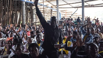 Belivers attend the Sunday mass without wearing masks and social distancing at Ufunuo na Uzima Church in Dar es Salaam on February 7, 2021. - For more than six months, Tanzania has tried to convince the world it has been cured of the coronavirus, through 