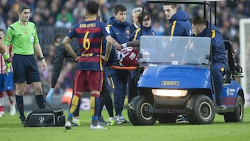 Augusto being carted off in Barcelona