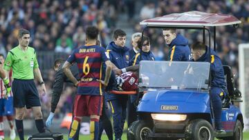 Augusto being carted off in Barcelona