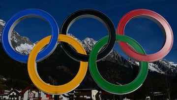 A picture shows the Olympic rings in Anterselva which will host the biathlon competition ahead of Milano Cortina 2026 Games, on December 12, 2025. (Photo by Stefano RELLANDINI / AFP)