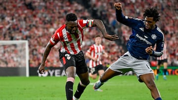 Athletic Bilbao's Spanish forward #09 Inaki Williams (L) vies for the ball with Manchester United's Danish defender #13 Patrick Dorgu during the UEFA Europa League semi final first leg football match between Athletic Club Bilbao and Manchester United at the San Mames stadium in Bilbao, on May 1, 2025. (Photo by ANDER GILLENEA / AFP)