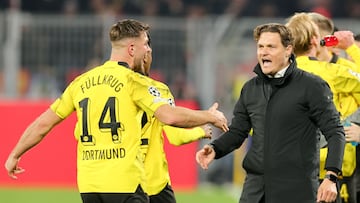 Dortmund (Germany), 16/04/2024.- Dortmund's Niclas Fullkrug (L) celebrates with Dortmund's head coach Edin Terzic after scoring the 3-2 lead during the UEFA Champions League quarter final, 2nd leg match between Borussia Dortmund and Atletico Madrid in Dortmund, Germany, 16 April 2024. (Liga de Campeones, Alemania, Rusia) EFE/EPA/FRIEDEMANN VOGEL
