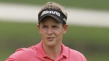 <b>UNA JORNADA.</B> La lluvia ha obligado a interrumpir en repetidas ocasiones el torneo desde el pasado sábado. A falta de una jorndad, Luke Donald encabeza la clasificación.