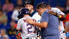 MIAMI, FLORIDA - AUGUST 15: Jose Altuve #27 of the Houston Astros speaks to medical staff during the first inning of the game against the Miami Marlins at loanDepot park on August 15, 2023 in Miami, Florida.   Megan Briggs/Getty Images/AFP (Photo by Megan Briggs / GETTY IMAGES NORTH AMERICA / Getty Images via AFP)