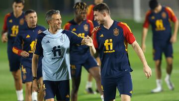 Luis Enrique, con Laporte.