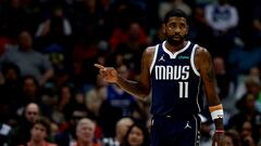 Kyrie Irving #11 of the Dallas Mavericks reacts after scoring a three-point basket during the third quarter against the New Orleans Pelicans at Smoothie King Center on November 12, 2023 in New Orleans, Louisiana.