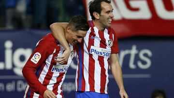 Godín y Fernando Torres, celebrando uno de los goles de Torres ante el Leganés.