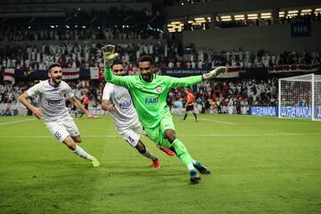 AL AIN, UNITED ARAB EMIRATES - DECEMBER 18: Khalid Eisa of AI Ain FC celebrates after saving the winning penalty during the FIFA Club World Cup UAE 2018 Semi Final match between River Plate and Al Ain at Hazza Bin Zayed Stadium on December 18, 2018 in Al Ain, United Arab Emirates. (Photo by Matthew Ashton - AMA/Getty Images)