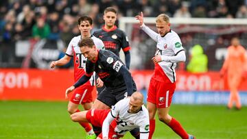UTRECHT, 19-02-2023, Stadion Galgenwaard, Dutch Eredivisie Football, season 2022 / 2023, during the match Utrecht - PSV, final result 2-2, FC Utrecht player Mike van der Hoorn, PSV player Luuk de Jong, FC Utrecht player Luuk Brouwers - Photo by Icon sport during the Dutch Eredivisie match between FC Utrecht and PSV Eindhoven at Stadion Galgenwaard on February 19, 2023 in Utrecht, Netherlands. (Photo by ProShots/Icon Sport via Getty Images)