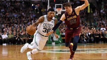 May 15, 2018; Boston, MA, USA; Boston Celtics guard Marcus Smart (36) drives against Cleveland Cavaliers guard Kyle Korver (26) during the third quarter in game two of the Eastern conference finals of the 2018 NBA Playoffs at TD Garden. Mandatory Credit: