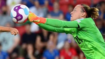 France's goalkeeper Pauline Peyraud-Magnin (R) punches the ball away from the path of Italy's striker Valentina Giacintini during the UEFA Women's Euro 2022 Group D football match between France and Italy at New York Stadium in Rotherham, northern England on July 10, 2022. - France won the match 5-1.
 - No use as moving pictures or quasi-video streaming. 
Photos must therefore be posted with an interval of at least 20 seconds. (Photo by FRANCK FIFE / AFP) / No use as moving pictures or quasi-video streaming. 
Photos must therefore be posted with an interval of at least 20 seconds. (Photo by FRANCK FIFE/AFP via Getty Images)