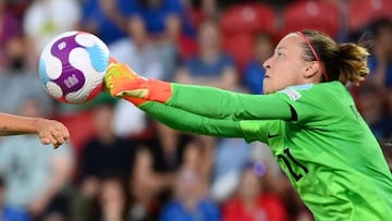 France's goalkeeper Pauline Peyraud-Magnin (R) punches the ball away from the path of Italy's striker Valentina Giacintini during the UEFA Women's Euro 2022 Group D football match between France and Italy at New York Stadium in Rotherham, northern England on July 10, 2022. - France won the match 5-1.
 - No use as moving pictures or quasi-video streaming. 
Photos must therefore be posted with an interval of at least 20 seconds. (Photo by FRANCK FIFE / AFP) / No use as moving pictures or quasi-video streaming. 
Photos must therefore be posted with an interval of at least 20 seconds. (Photo by FRANCK FIFE/AFP via Getty Images)